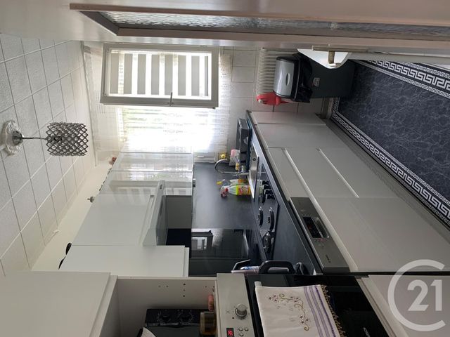 Afficher la photo en grand Appartement F3 à vendre - 3 pièces - 52.0 m2 - ST JEAN DE LA RUELLE - 45 - CENTRE - Century 21 Trois Rois